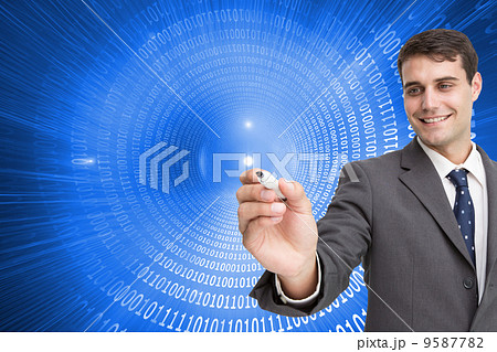 Composite image of young businessman writing something Composite image of young businessman writing something 9587782