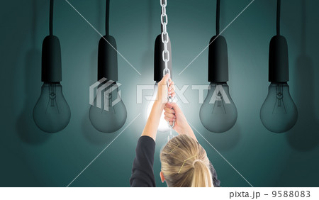 Composite image of businesswoman pulling a chain 9588083