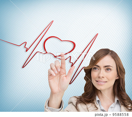 Composite image of smiling businesswoman pointing Composite image of smiling businesswoman pointing 9588558