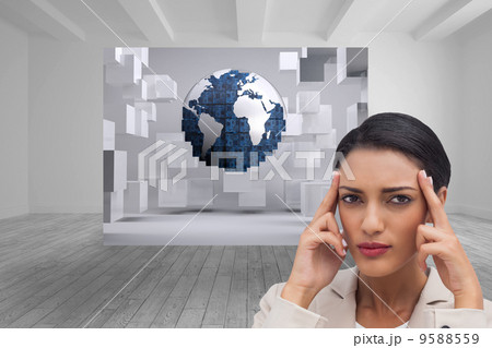 Composite image of young businesswoman putting her fingers on he 9588559
