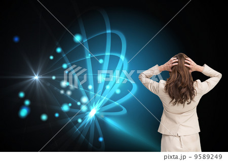 Composite image of businesswoman with hands on head standing bac Composite image of businesswoman with hands on head standing bac 9589249