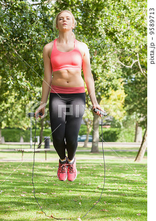 Strained blonde woman skipping 9589713