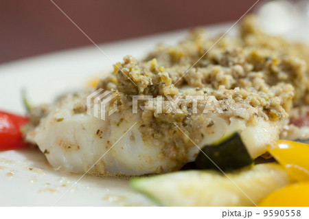 Close up of delicious fish dish with pesto Close up of delicious fish dish with pesto 9590558