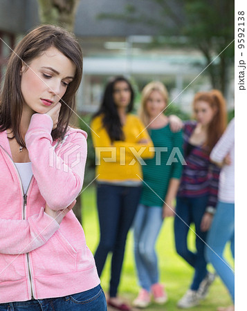 Student being bullied by a group of students 9592138