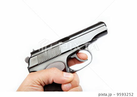 Gun in hand on a white background. 9593252
