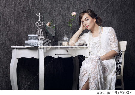 Beautiful girl on dark background 9595008
