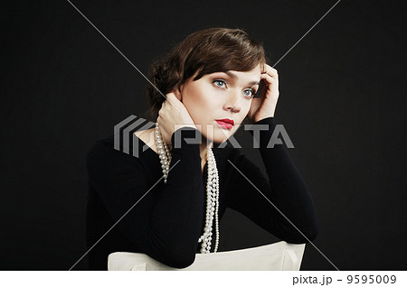 Beautiful girl on dark background 9595009