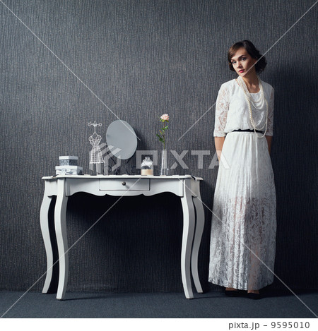 Beautiful girl on dark background 9595010