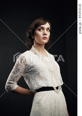 Beautiful girl on dark background Beautiful girl on dark background 9595016
