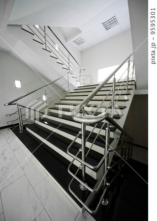 staircase with a steel handrail staircase with a steel handrail 9595301