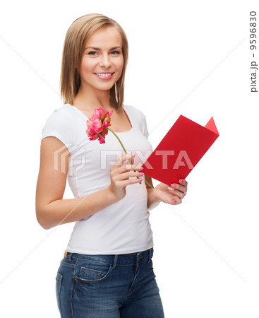 smiling girl with postcard and flower 9596830