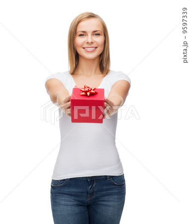 smiling girl with gift box smiling girl with gift box 9597339