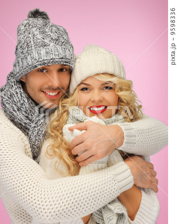 family couple in a winter clothes 9598336