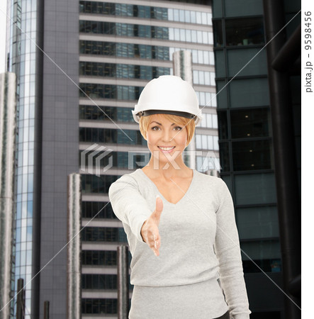 contractor in helmet ready for handshake 9598456