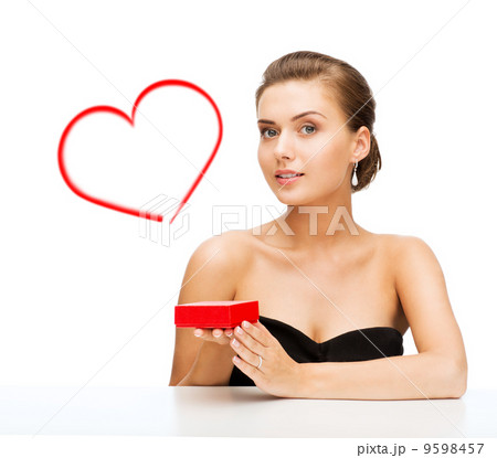 woman with diamond earrings and gift box woman with diamond earrings and gift box 9598457