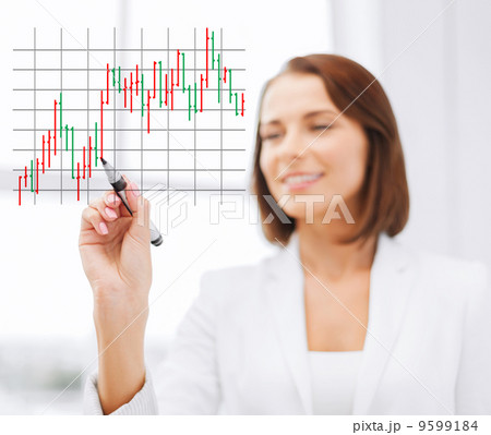 businesswoman drawing forex chart in the air 9599184