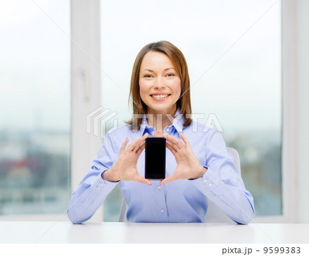 businesswoman with blank smartphone screen businesswoman with blank smartphone screen 9599383