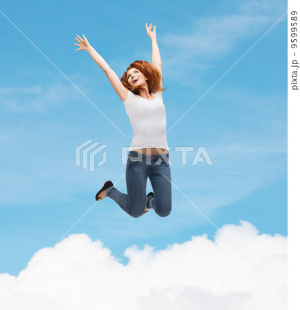 teenage girl in white blank t-shirt jumping teenage girl in white blank t-shirt jumping 9599589