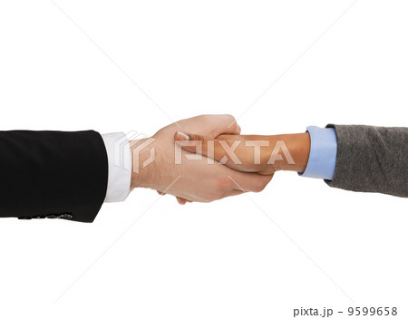 businessman and businesswoman shaking hands businessman and businesswoman shaking hands 9599658