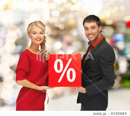 smiling man and woman with percent sign 9599884