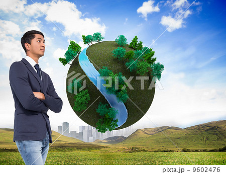 Composite image of unsmiling casual businessman with arms crosse Composite image of unsmiling casual businessman with arms crosse 9602476