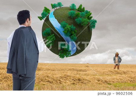 Composite image of businessman standing Composite image of businessman standing 9602506