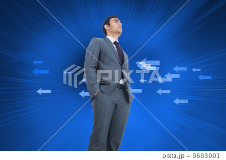 Composite image of unsmiling businessman standing 9603001