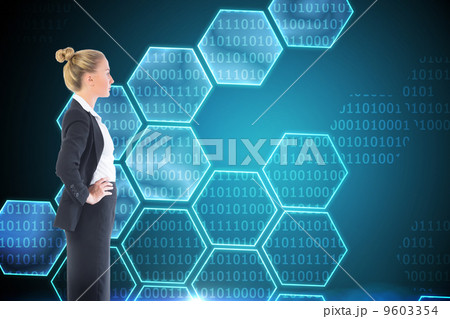 Composite image of businesswoman standing with hands on hips Composite image of businesswoman standing with hands on hips 9603354