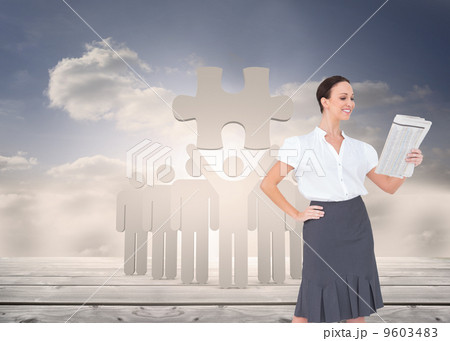 Composite image of cheerful stylish businesswoman holding newspa Composite image of cheerful stylish businesswoman holding newspa 9603483