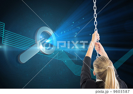 Composite image of businesswoman pulling a chain 9603587