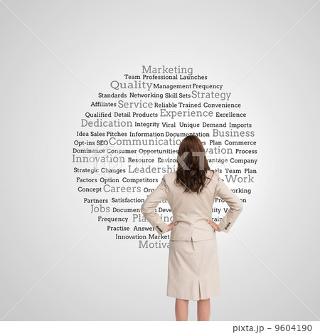 Composite image of businesswoman standing back to camera 9604190