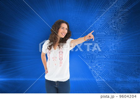 Composite image of cheerful attractive brunette wearing casual c Composite image of cheerful attractive brunette wearing casual c 9604204
