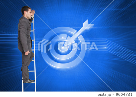 Composite image of stern businessman standing on ladder 9604731