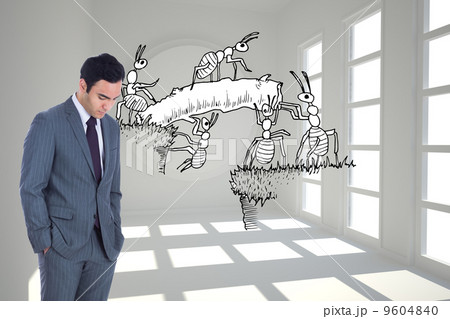 Composite image of unsmiling businessman standing 9604840