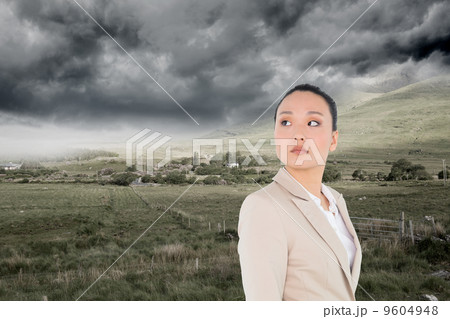 Composite image of unsmiling asian businesswoman Composite image of unsmiling asian businesswoman 9604948