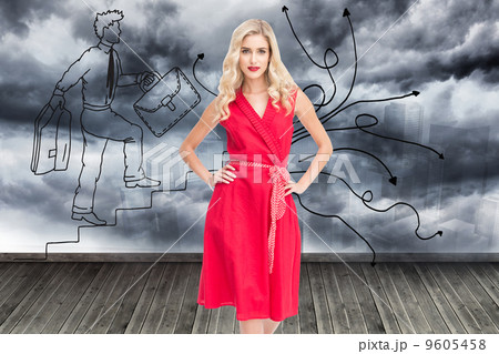 Composite image of elegant blonde standing hands on hips Composite image of elegant blonde standing hands on hips 9605458