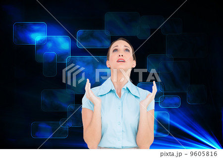 Composite image of concerned young businesswoman praying 9605816