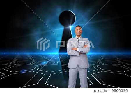 Composite image of assertive businessman on phone 9606036
