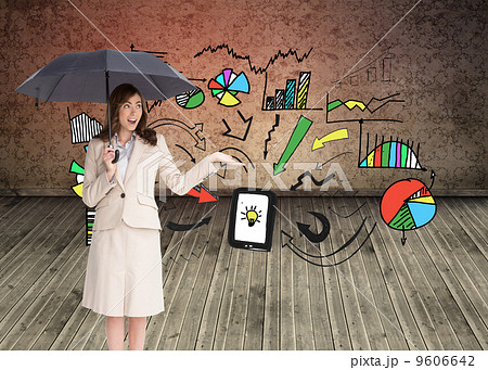 Composite image of elegant businesswoman holding black umbrella 9606642