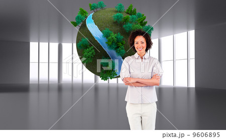 Composite image of businesswoman with crossed arms 9606895