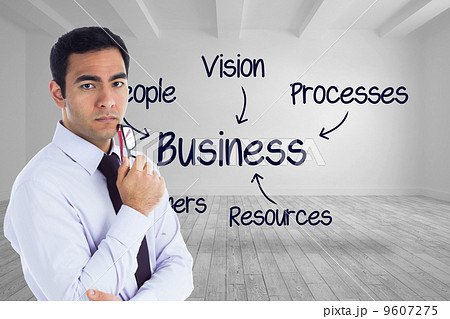 Composite image of unsmiling businessman holding glasses 9607275