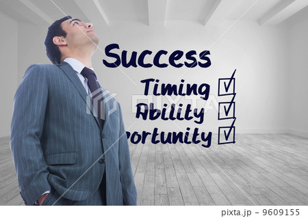 Composite image of unsmiling businessman standing Composite image of unsmiling businessman standing 9609155