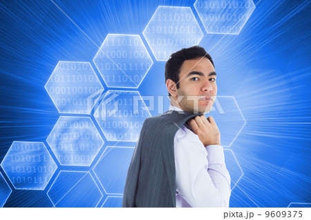Composite image of unsmiling businessman standing Composite image of unsmiling businessman standing 9609375