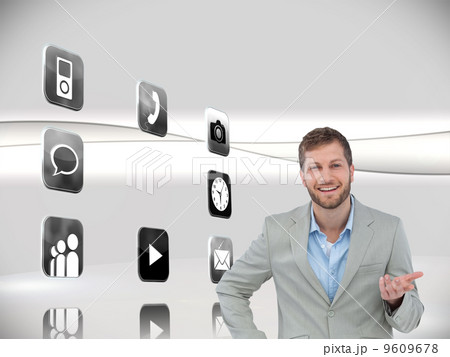 Composite image of stylish man smiling and gesturing Composite image of stylish man smiling and gesturing 9609678