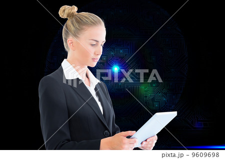 Composite image of businesswoman holding tablet Composite image of businesswoman holding tablet 9609698