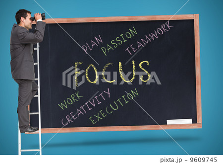 Composite image of businessman standing on ladder 9609745