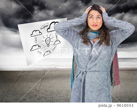 Composite image of anxious pretty brunette wearing winter clothe Composite image of anxious pretty brunette wearing winter clothe 9610033