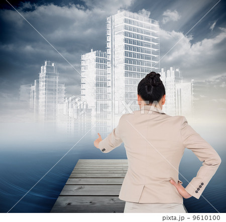 Composite image of asian businesswoman pointing Composite image of asian businesswoman pointing 9610100