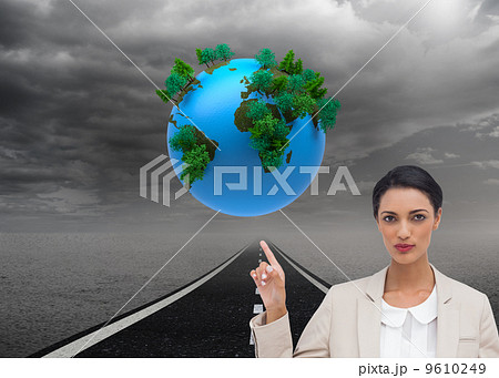 Composite image of serious businesswoman with hands up Composite image of serious businesswoman with hands up 9610249