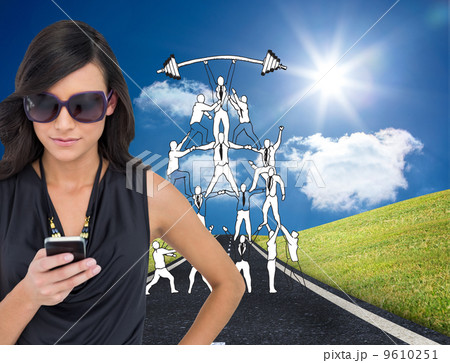 Composite image of happy brunette using smartphone Composite image of happy brunette using smartphone 9610251